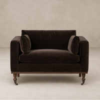 Brown velvet armchair on a beige background