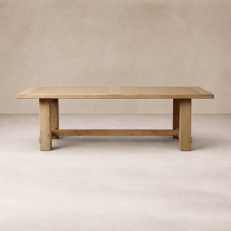 Front view of the Verona Weathered Pine Dining Table, showcasing its rustic finish and sturdy design.