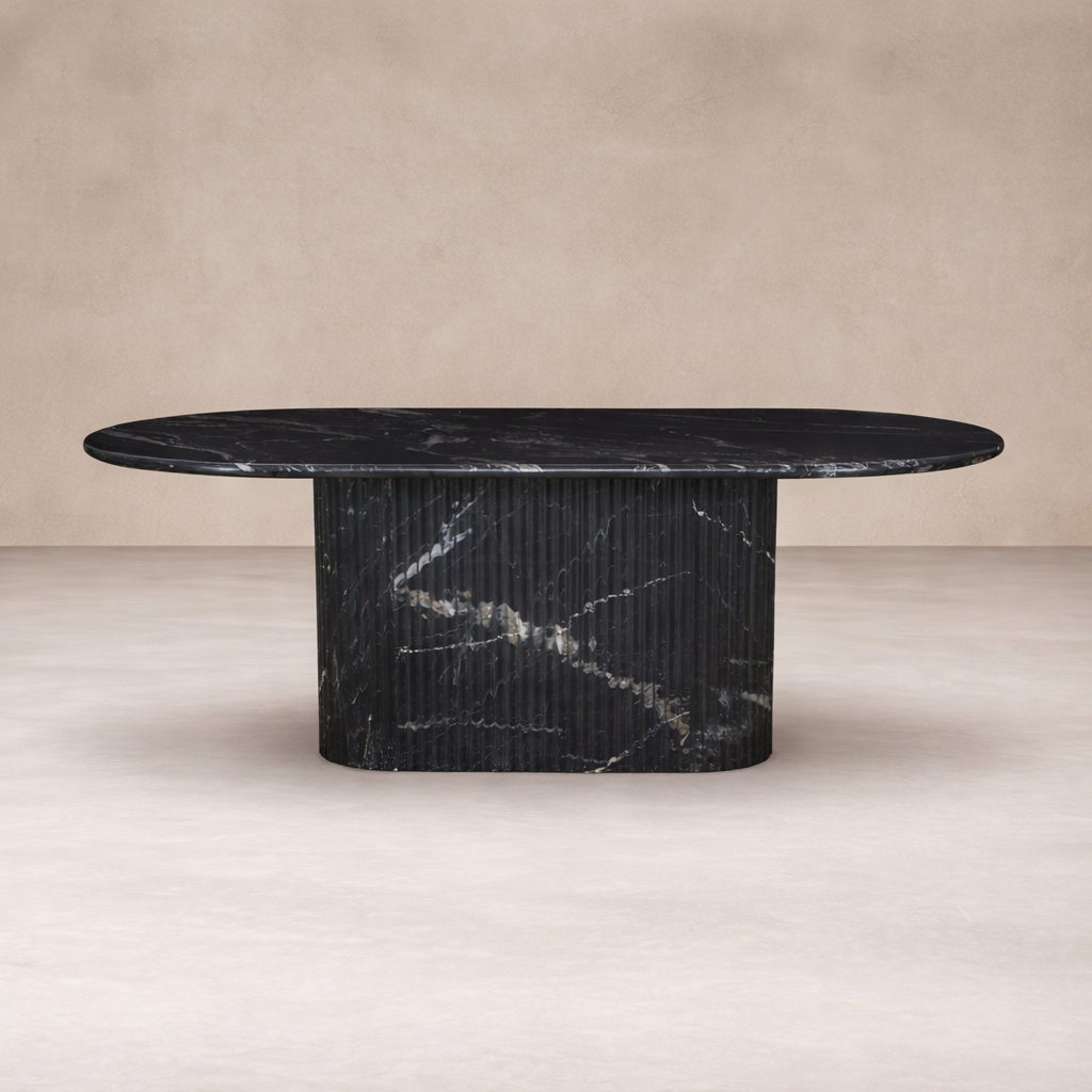 Front view of the Elysia Dining Table, featuring a sleek oval top and elegant ribbed base in dark marble.