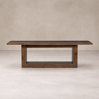 Front view of the Thalia Dining Table showcasing its sleek design and rich wood finish.