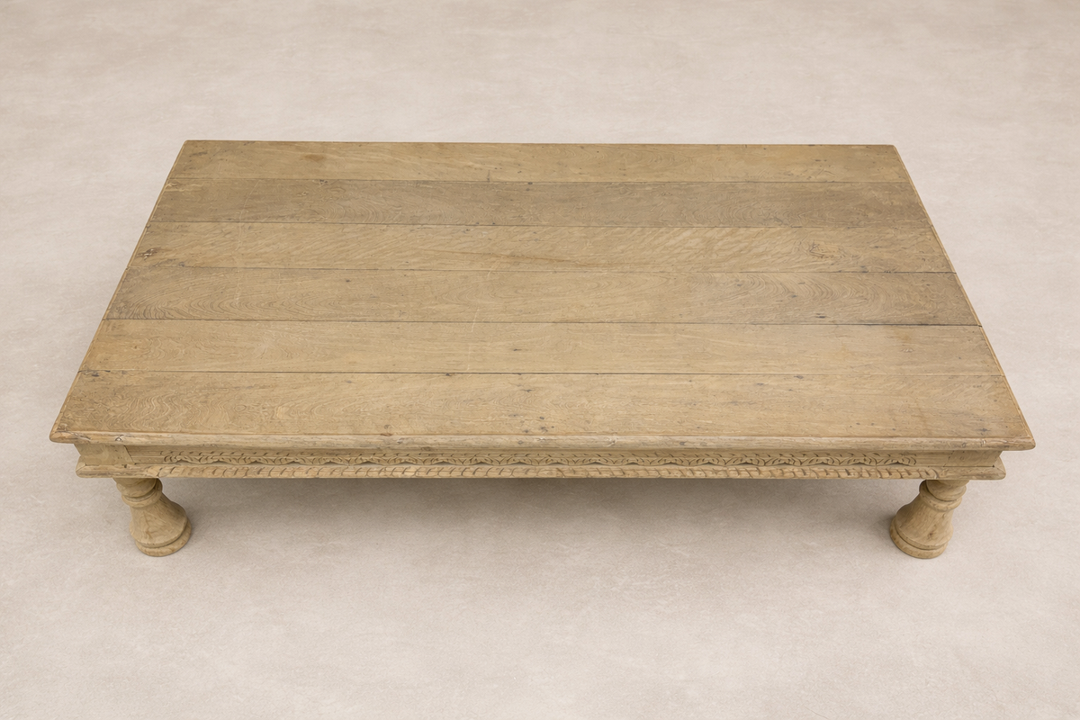 Top view of the Dharma Vintage Takhat Coffee Table showcasing its rustic wood finish and intricate carvings.