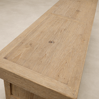 Detail of the Daphne Weathered Sideboard showcasing its rustic wood grain and natural finish.