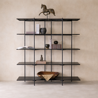Three-quarter view of the Monaco Forged Iron Bookshelf showcasing its sleek black finish and open design.