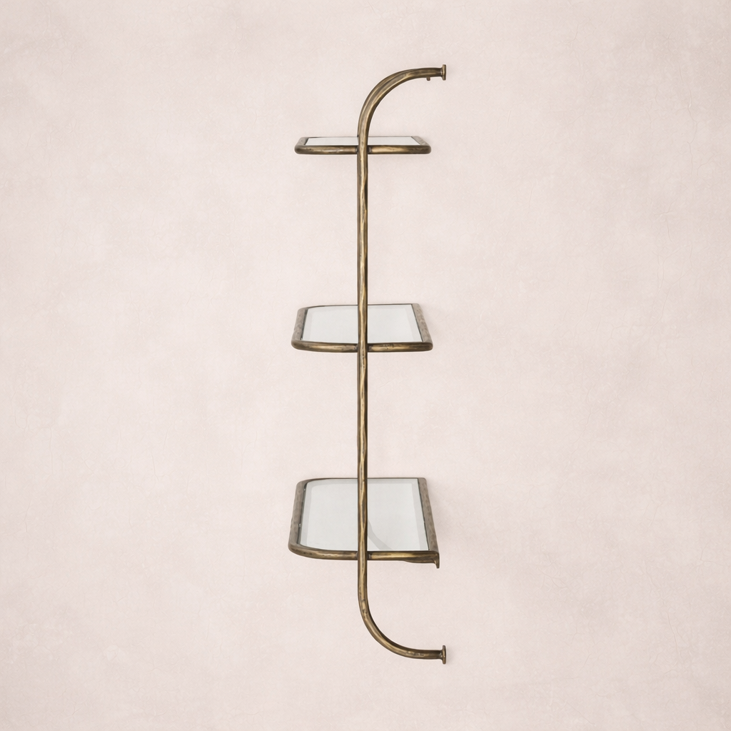 Side view of the Winslow Shelf featuring four glass shelves with a sleek brass frame.