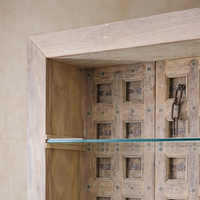 Detail of the Amaranth Vintage Haveli Door Bookshelf showcasing its rustic wood finish and glass shelf.
