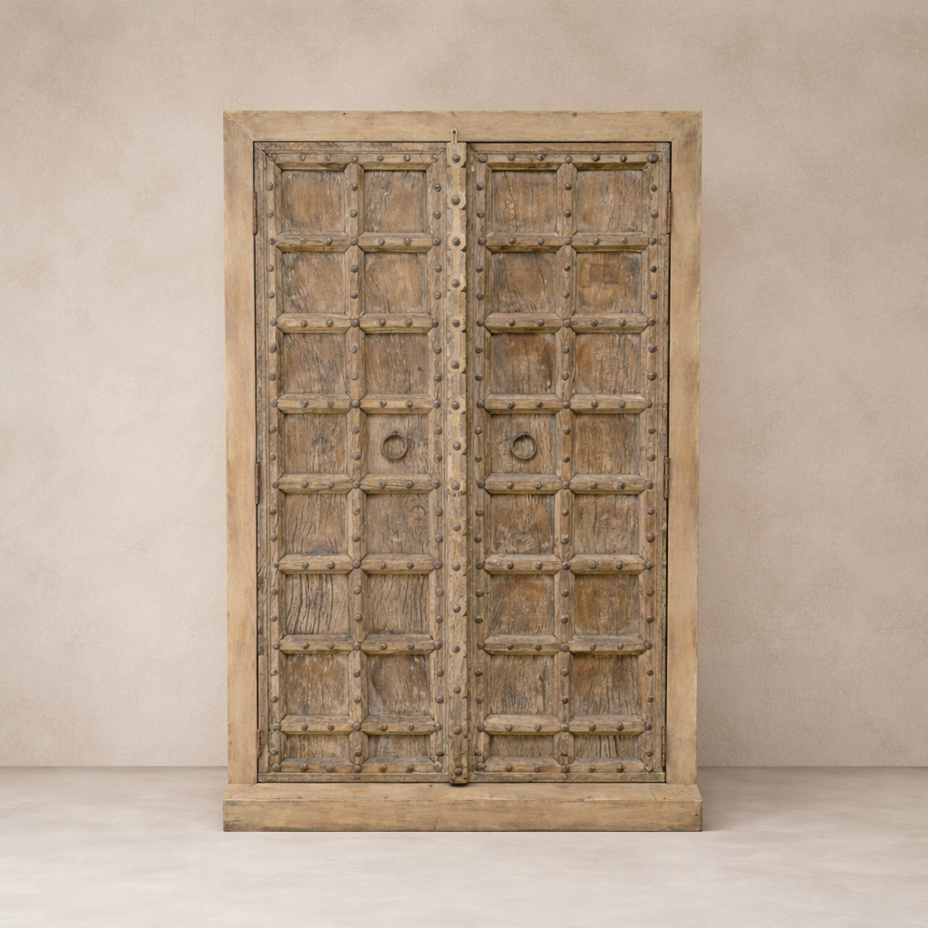 Front view of the Hanoi Vintage Haveli Door Cabinet featuring intricate wood detailing and a rustic finish.