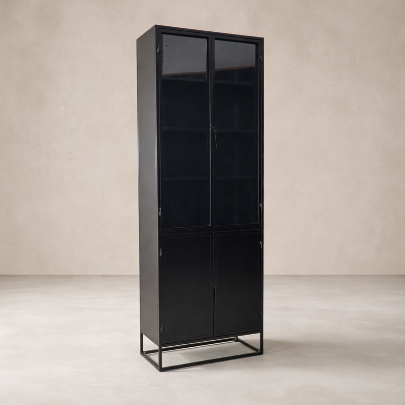 Three-quarter view of the Anton Iron and Glass Cabinet showcasing its sleek black finish and spacious storage.