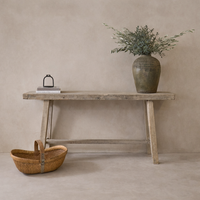 Rustic Rioja Vintage Teak Console Table styled with a decorative vase and books against a neutral backdrop.