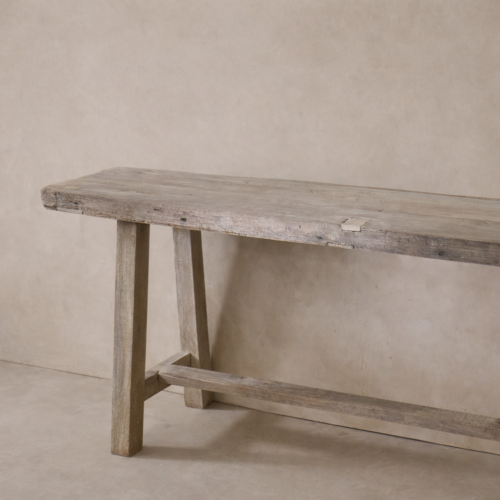 Rustic Rioja Vintage Teak Console Table showcasing a weathered finish and sturdy legs.