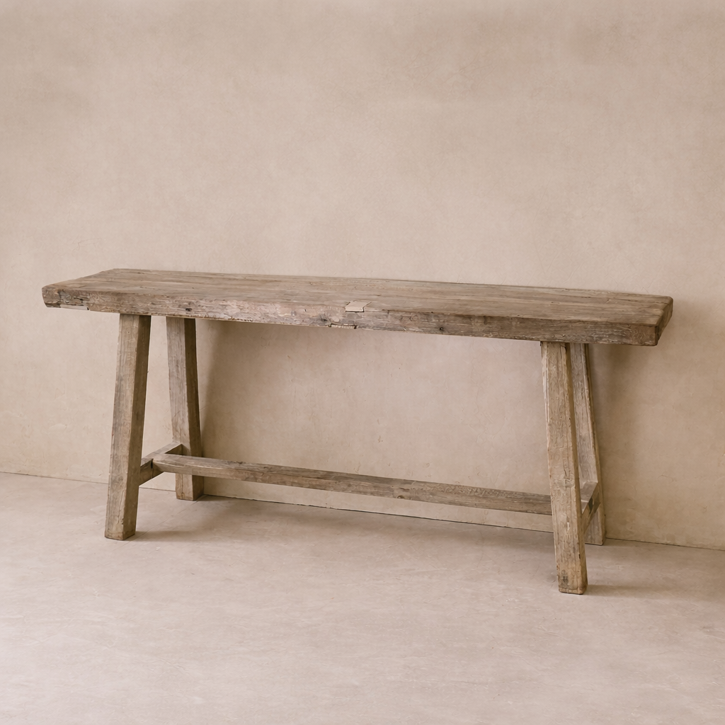 Rustic Rioja Vintage Teak Console Table with a natural finish and sturdy legs.
