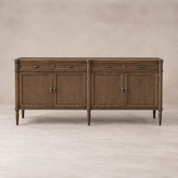 Front view of the Yara Sideboard in warm wood finish, featuring sleek hardware and classic design.