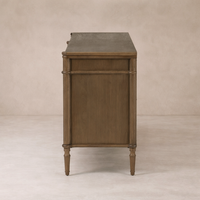 Side angle of the Yara Sideboard, showcasing its elegant wood finish and classic tapered legs.