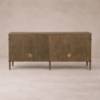Front view of the Yara Sideboard featuring a rustic wood finish and round hardware accents.