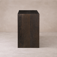 Front view of the Lazuli Sideboard in dark wood, showcasing its sleek, minimalist design.