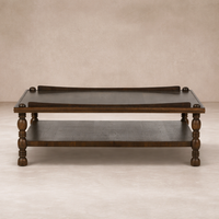 Front view of the Zephyr Coffee Table, showcasing its rich wood finish and elegant turned legs.