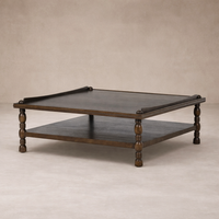 Three-quarter view of the Zephyr Coffee Table, featuring a dark wood finish and elegant turned legs.