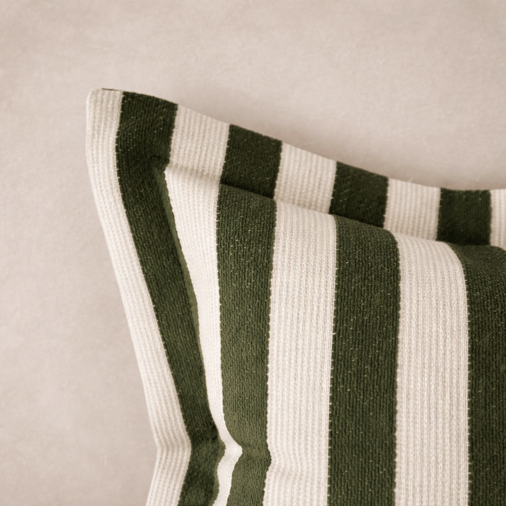 Close-up of the Orla Striped Pillow in Olive Green, highlighting its textured fabric and bold stripes.