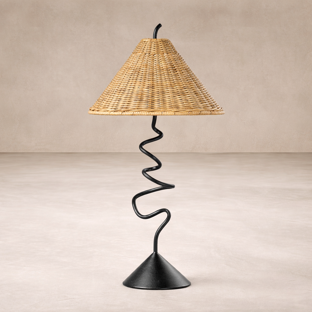 Side angle of the Anya Lamp featuring a woven conical shade and a sleek, twisted black metal base.
