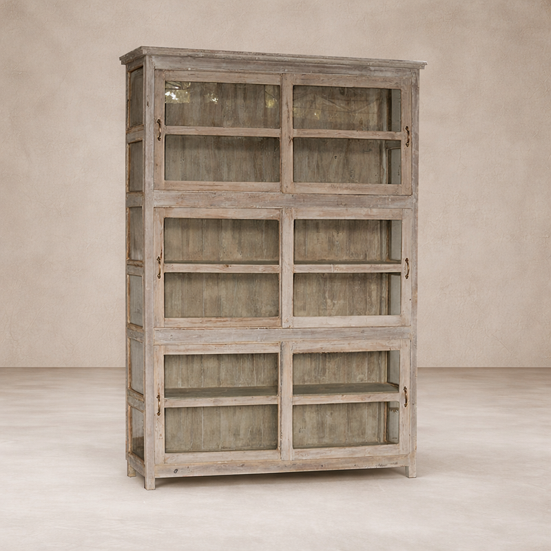 Front view of the Adorra Vintage Teak Library Cabinet, showcasing its rustic finish and glass doors.