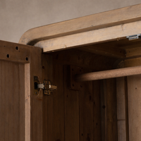 Detail of the Solana Cabinet showcasing its wooden interior and sturdy hardware.
