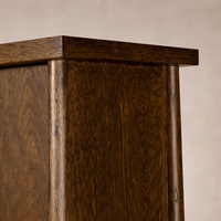 Detail of the Elowen Cabinet showcasing its rich wood grain and smooth, sturdy finish.
