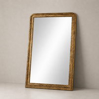 Antiqued Gold Leaf Antonia Floor Mirror with ornate textured frame detail.