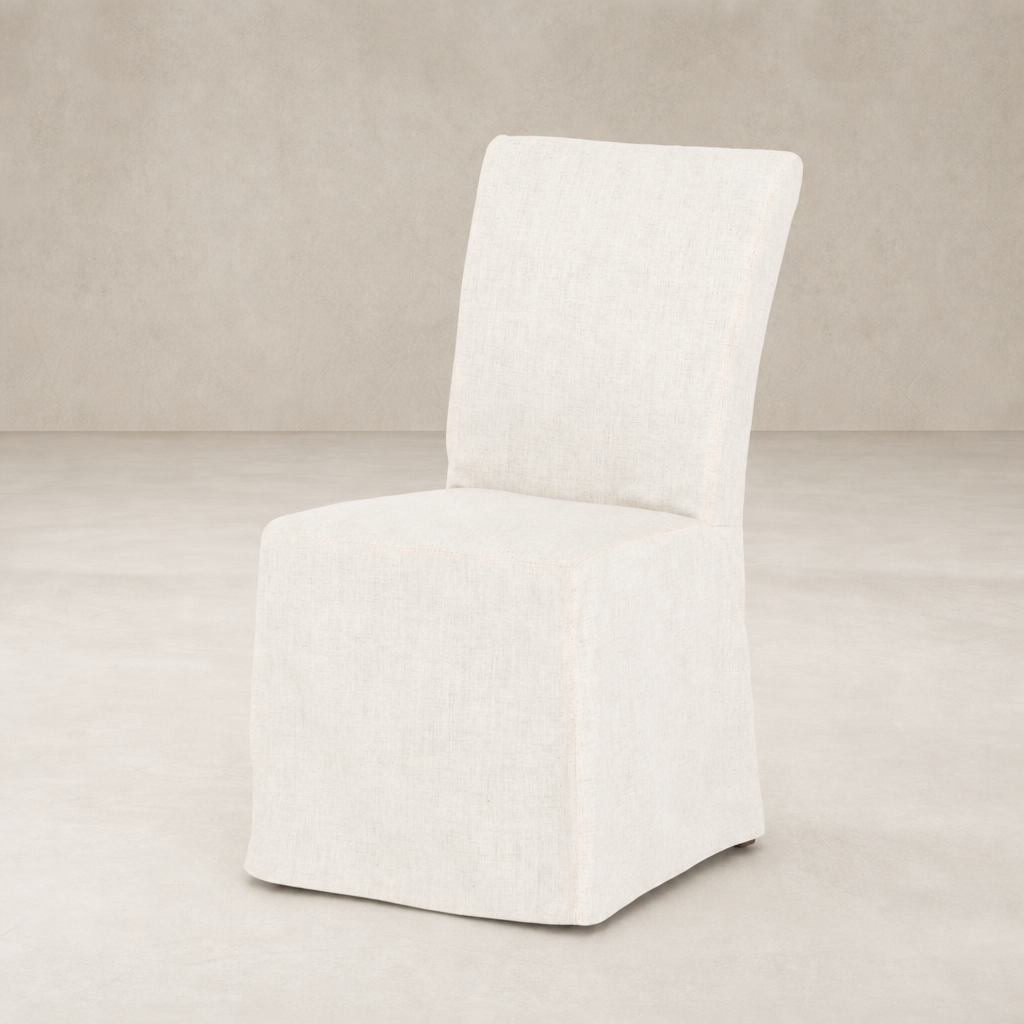 Sierra Slipcovered Dining Chair in soft, textured fabric with a minimalistic design.