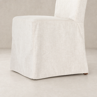 Sierra Slipcovered Dining Chair in soft, textured fabric with a tailored design.