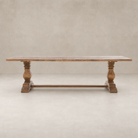 Castelli Dining Table in waxed bleached reclaimed pine with ornate turned legs.