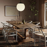 Castelli Dining Table featuring waxed bleached reclaimed pine with a rustic finish.