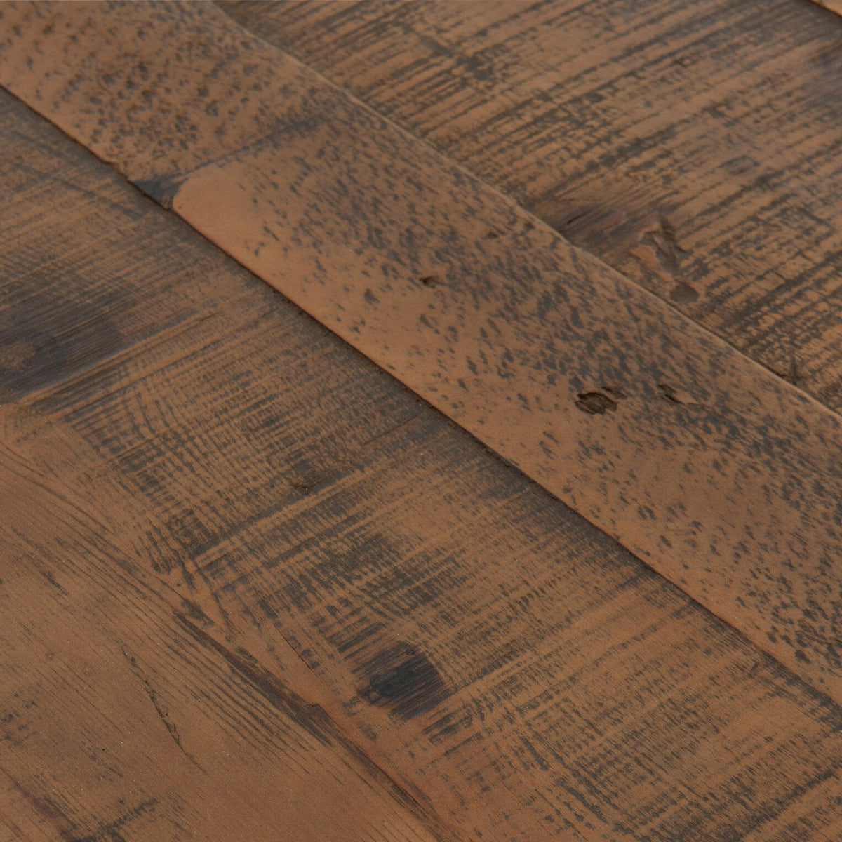 Close-up of the Castelli Dining Table in waxed bleached reclaimed pine, showcasing rustic texture and grains.
