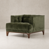 Sapphire Olive Murano Chair with plush upholstery and wooden legs in a studio setting.