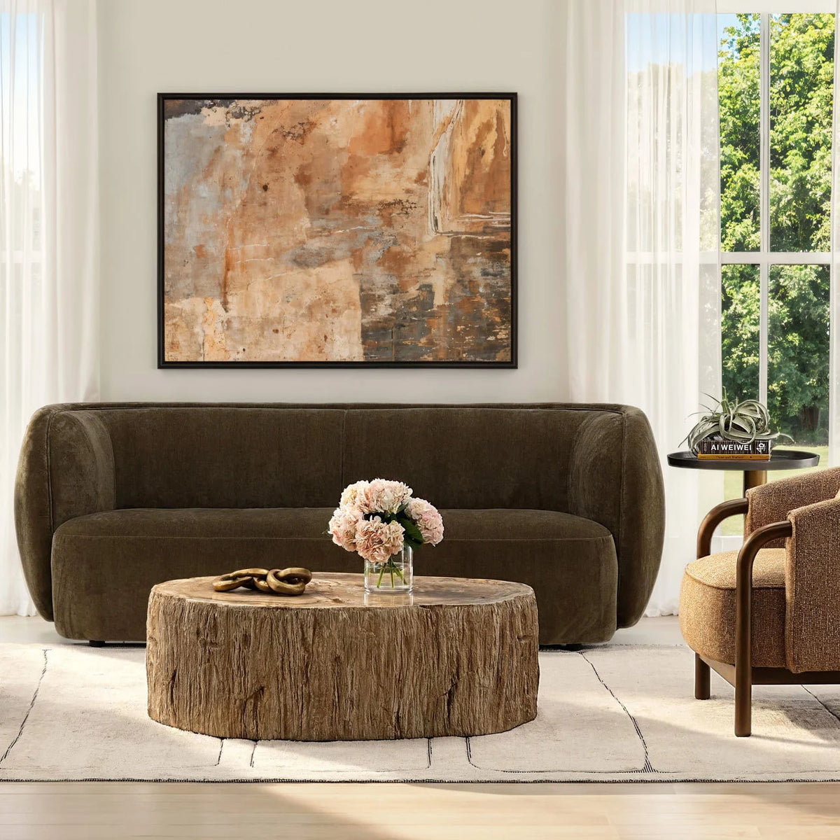 Rustic wood Arik Coffee Table in a cozy living room setting, accented by floral decor.