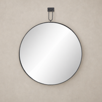 Circular Vida Mirror with a sleek black metal frame, perfect for modern decor.