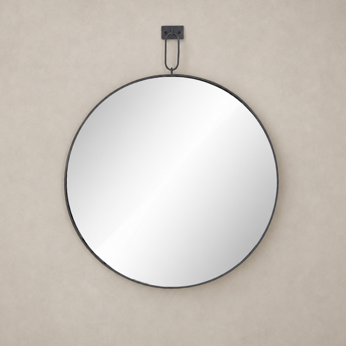 Circular Vida Mirror with a sleek black metal frame, perfect for modern decor.