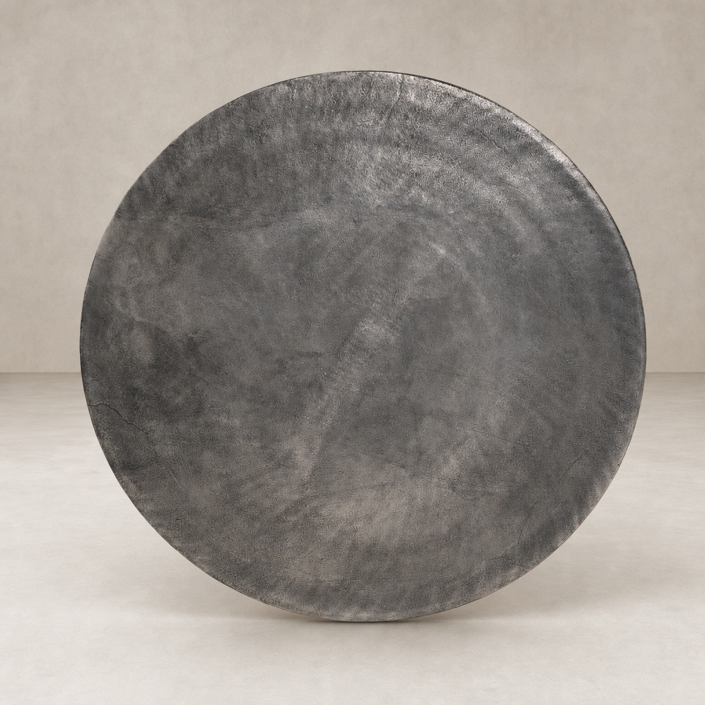 Kensington Bistro Table in Raw Antique Nickel with a sleek, round surface finish.