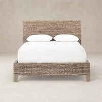 Grey wash mango leaf bed featuring a woven headboard and clean lines.
