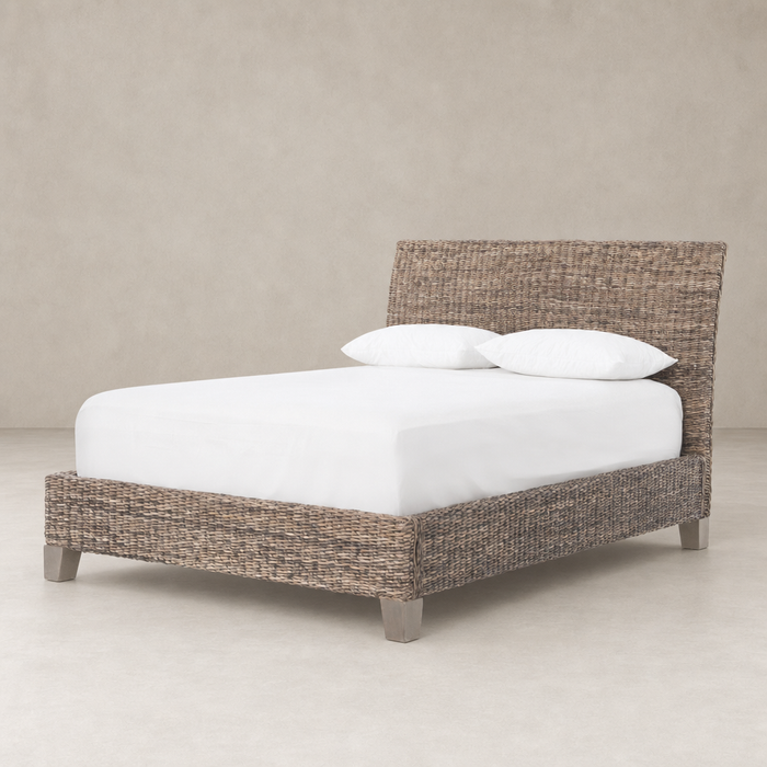 Grey wash mango leaf bed with woven headboard and sleek design.