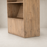 Tahoe Bookshelf in natural wood finish featuring open shelves and concealed storage.