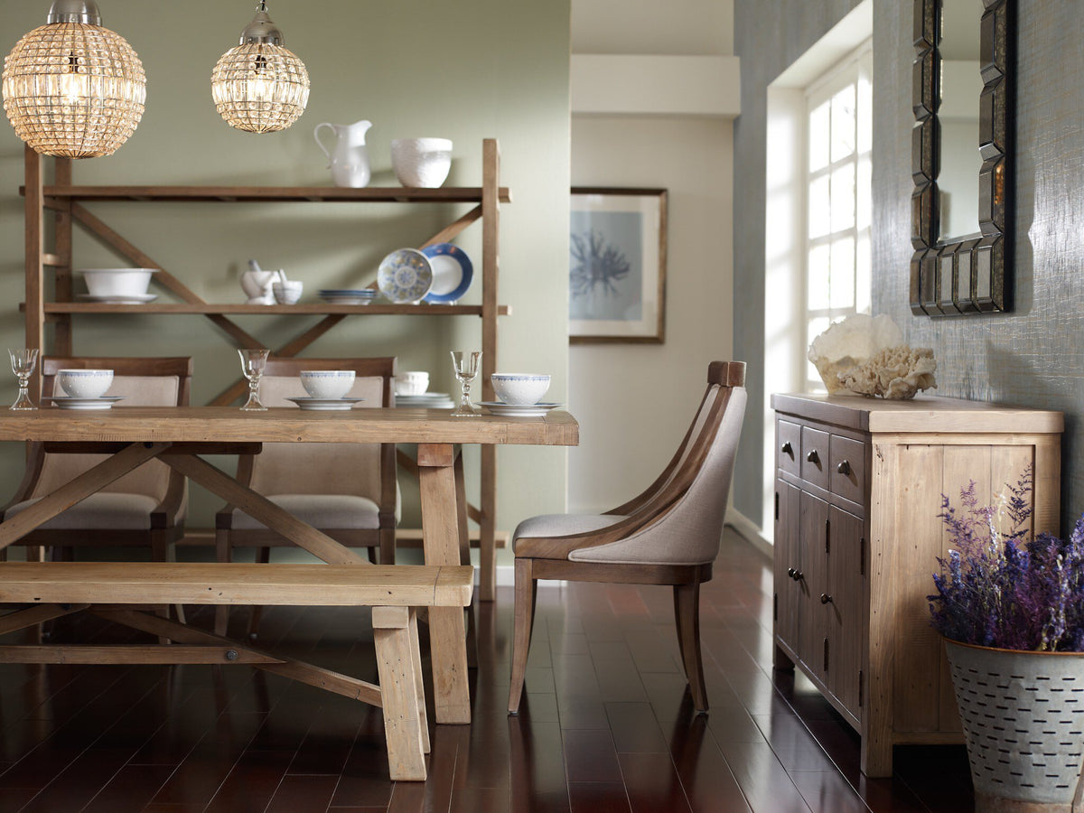 Camden Large Bookshelf featuring natural wood, elegantly displaying dishes and decorative items.